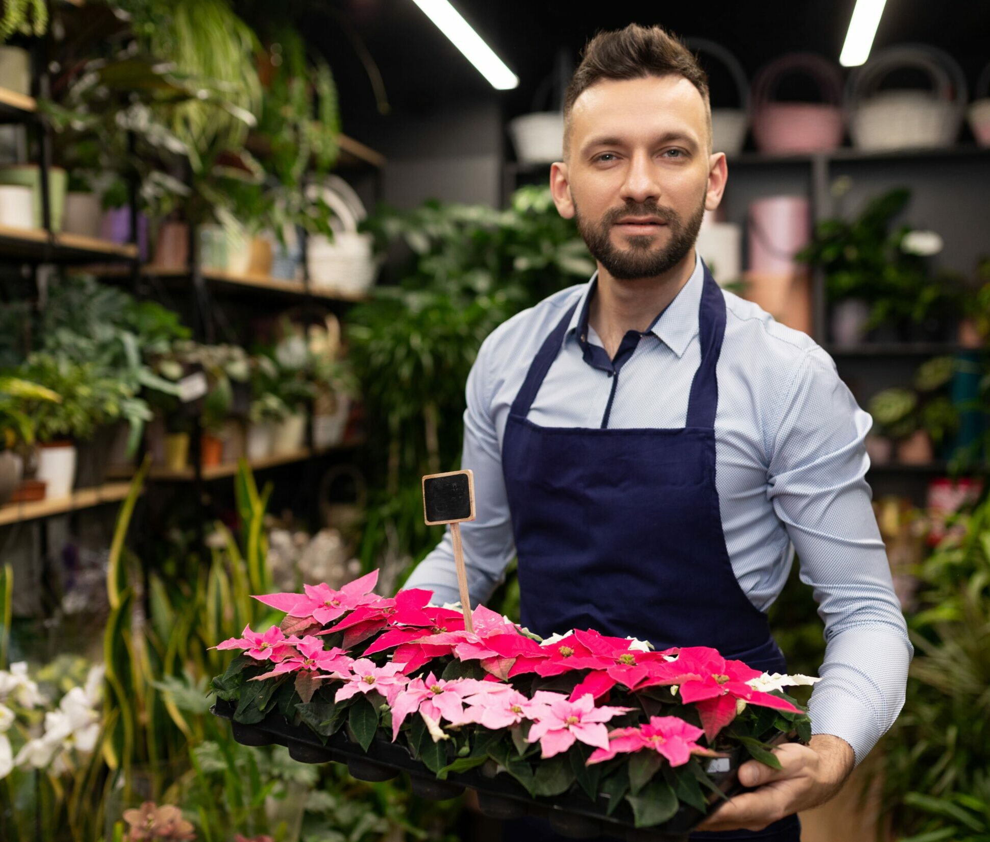 a-flower-seller-in-a-floristic-salon-holds-a-tray-2025-02-12-05-31-45-utc (1)